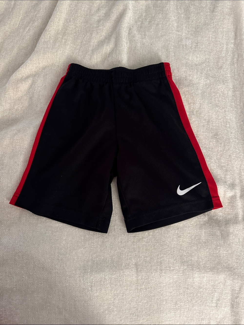 Nike Kids Black Shorts with Red Side Panels
